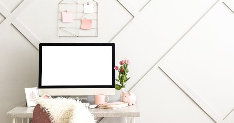 Home office with desk, chair, and computer for working from home