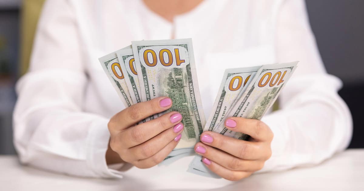 Woman counting cash